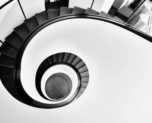 aerial photo of black spiral staircase